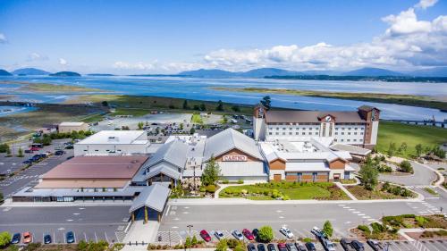 an aerial view of a large building with a parking lot at Swinomish Casino & Lodge in Anacortes