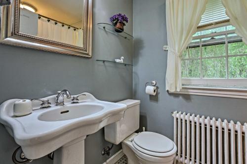 A bathroom at Historic Essex Home with Large Yard Near Downtown!