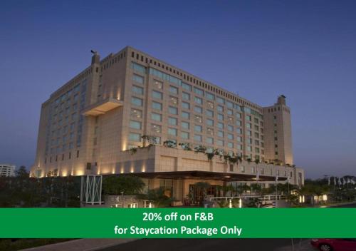a large hotel building with a sign for vacation package only at Radisson Blu Hotel, Nagpur in Nagpur