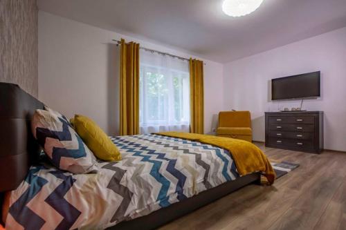 Postel nebo postele na pokoji v ubytování Casa Sonia Sighisoara