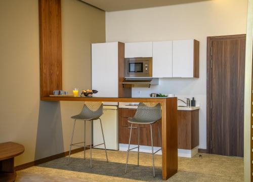 Una cocina o zona de cocina en BH Appart Hotel