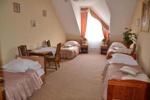 Postel nebo postele na pokoji v ubytování Kruiz Motel
