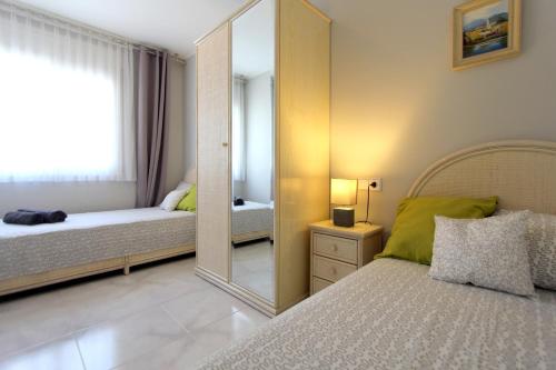 LEON INMO Apartment Panoramica - 11095にあるベッド