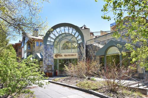 a building with an archway on the side of it at Gateway Plaza R4 Condo in Vail