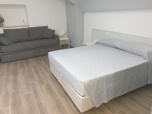 Postel nebo postele na pokoji v ubytování A DUE PASSI BED & BREAKFAST