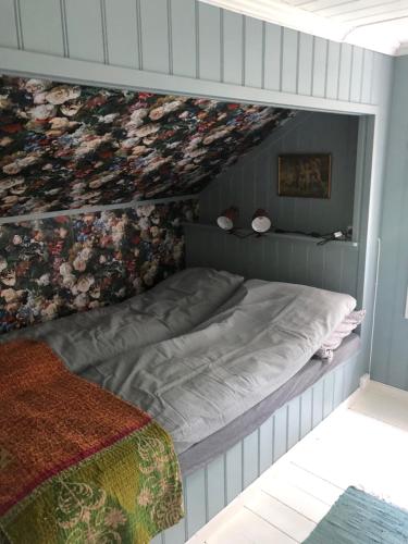 Katil atau katil-katil dalam bilik di Huset ved evja