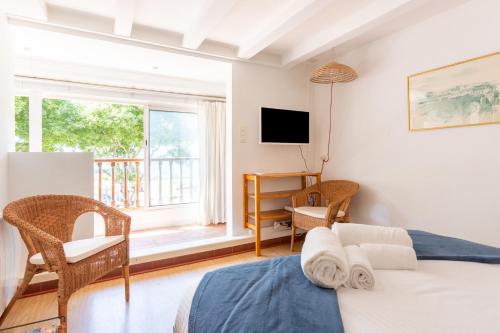 Postel nebo postele na pokoji v ubytování CABINE 56 - Comme une cabine de Bateau à l'entrée du Port