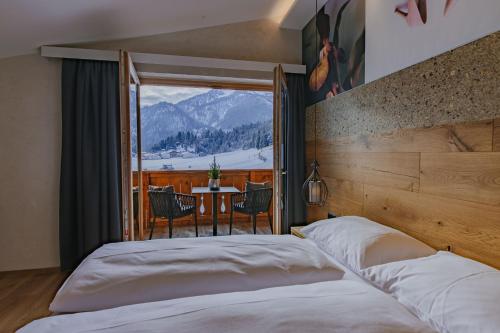 Cama o camas de una habitación en loisi's Boutiquehotel
