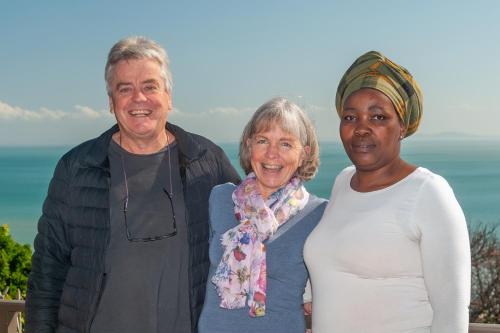 a couple of women standing next to each other at 18 On Kloof Guest House in Gordonʼs Bay