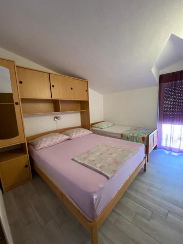 Posteľ alebo postele v izbe v ubytovaní Villa Nada