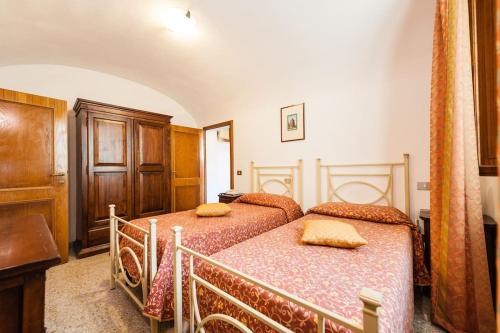 Ένα ή περισσότερα κρεβάτια σε δωμάτιο στο Residence Domus