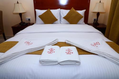  Onyx Hotel Apartments -  Room  picture :   Shower    Safety deposit box    TV                           