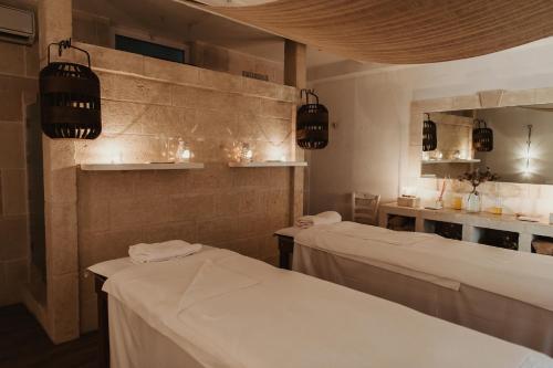 Cama o camas de una habitación en Canne Bianche Lifestyle Hotel