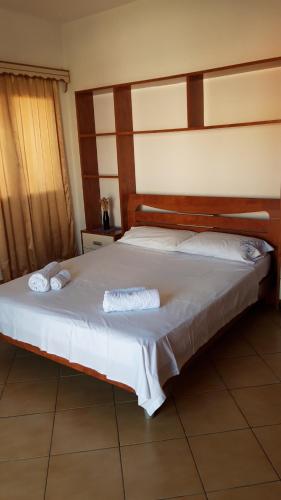 Postel nebo postele na pokoji v ubytování Apartament Gloria&Mitati