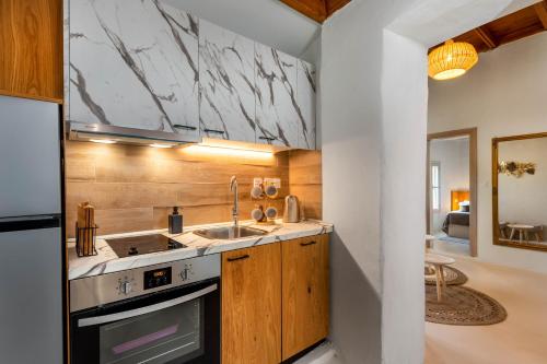 Kuchyň nebo kuchyňský kout v ubytování Voyaz Boutique Apartments & Suites -Old Town