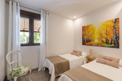 Postel nebo postele na pokoji v ubytování VILLA FINA (piscina/wifi/barbacoa/parking)