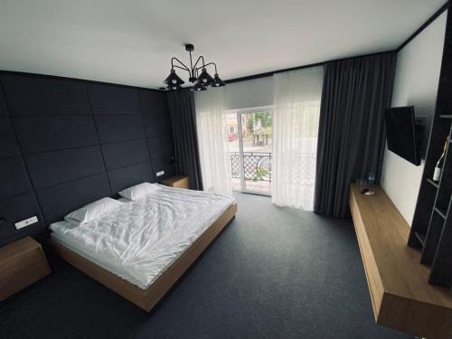 Postel nebo postele na pokoji v ubytování Hotel Terrazzo