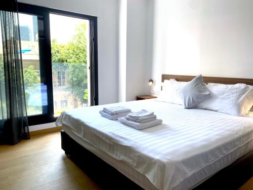 Letto o letti in una camera di Urban Habitat Executive Suites