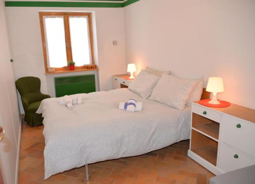 En eller flere senger på et rom på House Nuova Nube by Holiday World