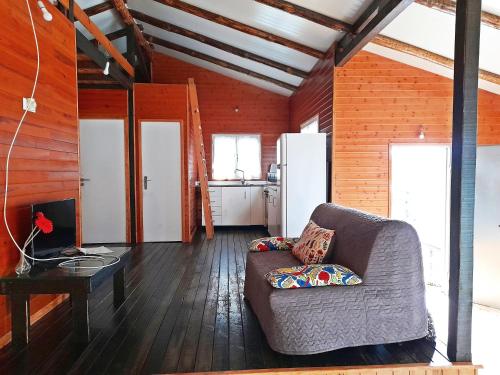 a living room with a couch and a table at Casa das Aveleiras - Sátão in Sátão