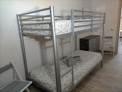 Postel nebo postele na pokoji v ubytování Casa Vacanze Samuel Beach