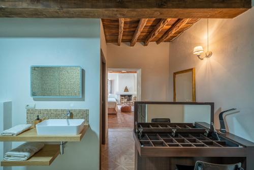 a kitchen with a stove and a sink in a room at ROBBY'S ibiza in Sant Josep
