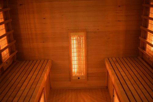 an empty room with a window in a sauna at Gite 5 pers avec 2h espace bien-être privatisé inclus dans le prix de la nuit 80m2 de détente in Équilly