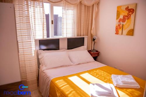 Кровать или кровати в номере Loft Flores- Centro da cidade!
