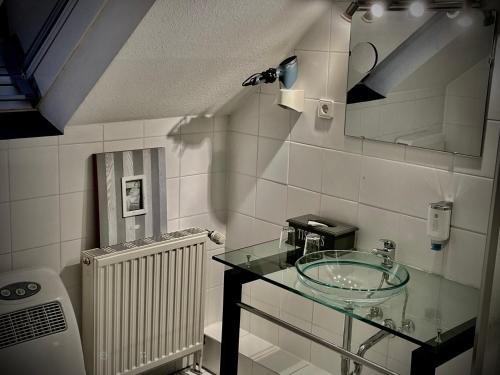 Ванная комната в Hotel Am Volksgarten