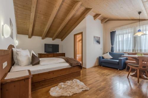 Postel nebo postele na pokoji v ubytování Crëp Sella
