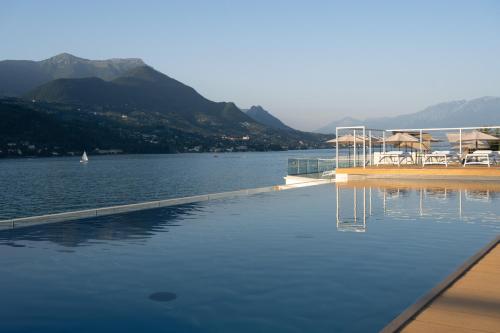 a view of a body of water with a dock at Ah Porticcioli Boutique Apartments in San Felice del Benaco
