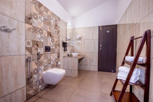 Kúpeľňa v ubytovaní Tuskers Hill by Poppys Anaikatti