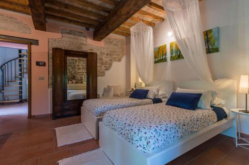 Voodi või voodid majutusasutuse Villa La Torre toas