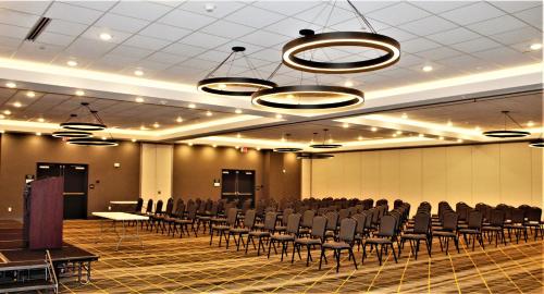 a large room with rows of chairs in it at Holiday Inn Fort Worth - Alliance by IHG in Fort Worth