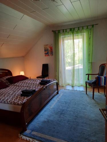 Säng eller sängar i ett rum på Ferienwohnung Wagner