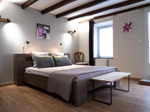 Un pat sau paturi într-o cameră la Mas de Chaufondes