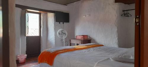 Postel nebo postele na pokoji v ubytování Hotel Central Graciela