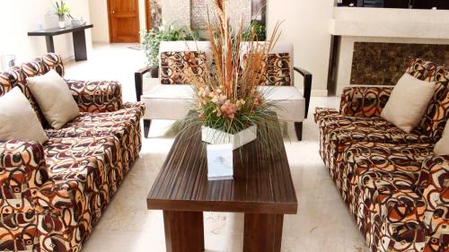 Zona de estar de Hotel Magno Tepatitlán