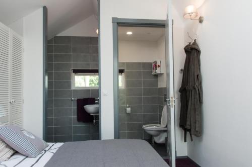 Koupelna v ubytování Beleef het Noorden