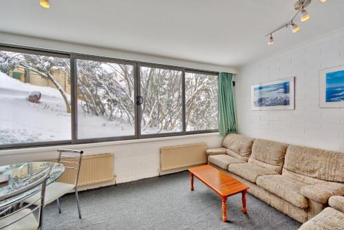 
A seating area at Snow Ski Apartments 05
