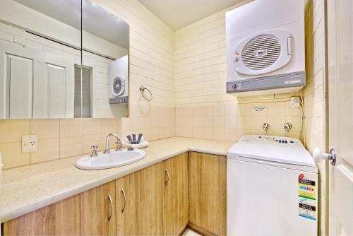 Kuchyň nebo kuchyňský kout v ubytování Snow Ski Apartments 31