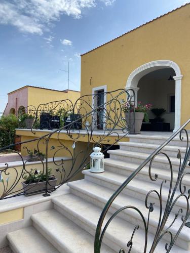 a set of stairs in front of a building at Villa Enza B&B in Ginosa