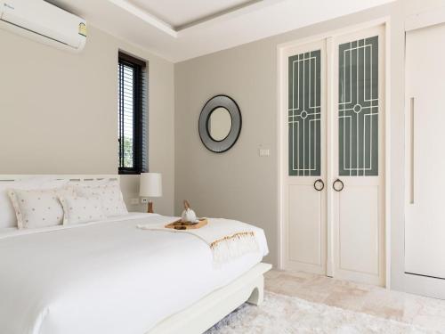 Postel nebo postele na pokoji v ubytování Skye Beach Hotel - Koh Samui