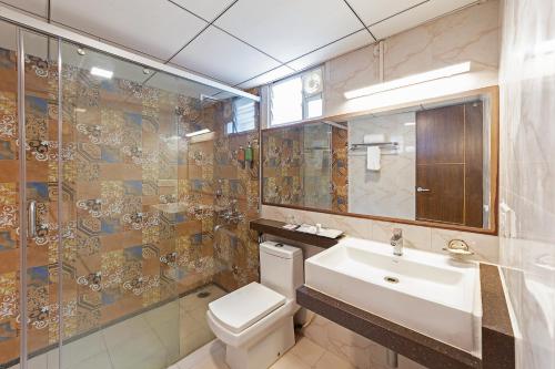 A bathroom at Icon Regency by Bhagini