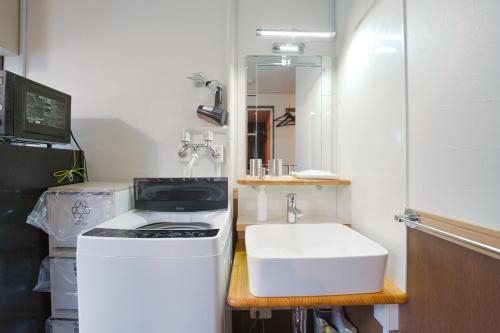 Pet-friendly C Hotel Biei Shiroganeにあるバスルーム
