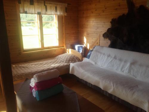 Postel nebo postele na pokoji v ubytování Aratsaare Holiday home