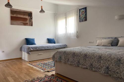 Llit o llits en una habitació de Charming apartment in Becerril de la Sierra