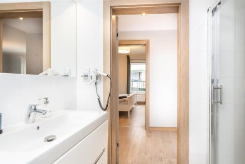 Et badeværelse på Apartament Mio Mare