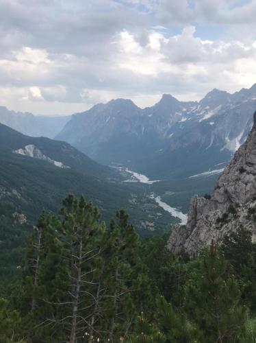 a view of a valley from a mountain at Hotel Margjeka in Valbonë