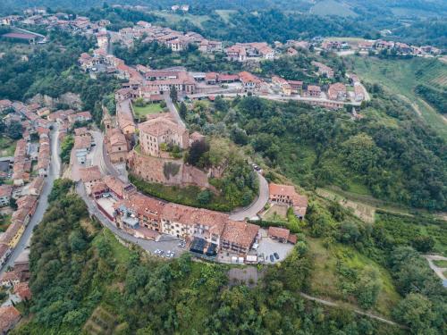 an aerial view of a mansion on a hill at Il Borgo B&B in Castellinaldo